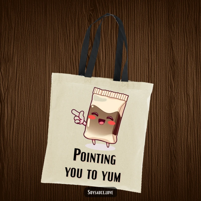 Funny tote bag with a giggling kawaii soy sauce packet pointing with an excited flourish, perfect for carrying essentials with a smile.